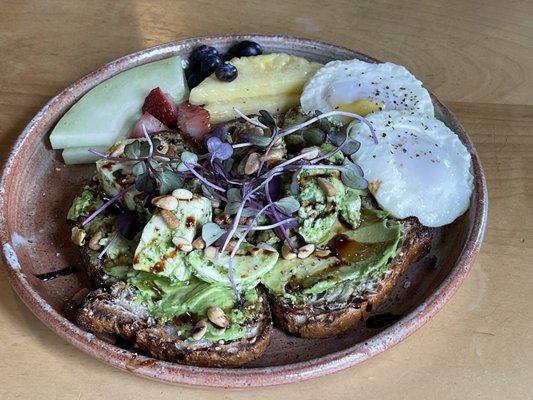 Avocado toast, poached eggs added