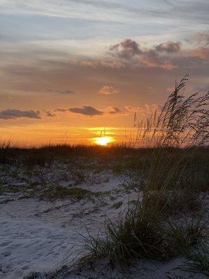 Colorful sunsets on empty beaches