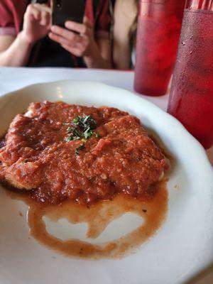 Fried mozzarella appetizer with a tangy sauce