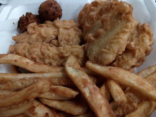 Fish, chicken, chips, and hush puppies