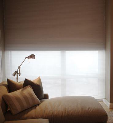 Double motorized honeycomb shade. Light- filtering and Blackout