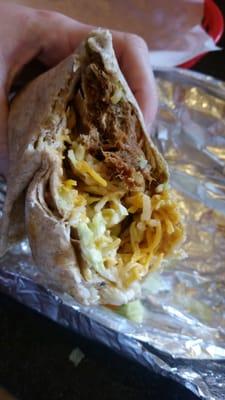 The goodies inside my pulled pork burrito