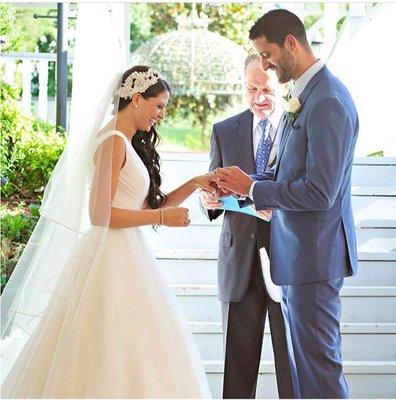 Our beautiful White Swan Bridal bride Joelle on her wedding day wearing Ellis Bridal wedding gown, custom headpiece and cathedral veil!