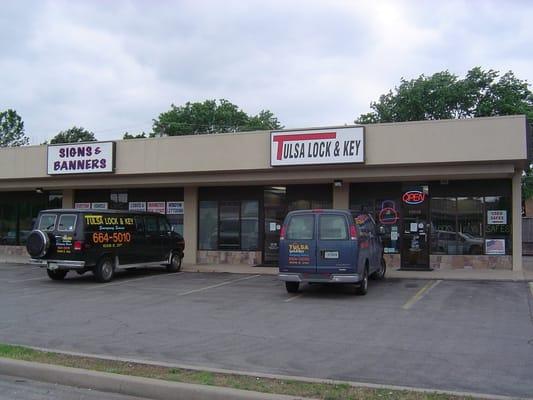 #throwback This is an archive photo of our old vans and signs.  Our showroom has always been located at 21st and 169 in Tulsa.