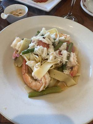 Dinner special with shrimp and crab in a white wine sauce