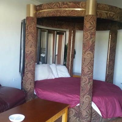 This is a room with a round bed. It cost $55.00 per day