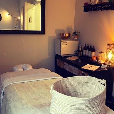 Cozy treatment room for Ayurvedic body therapies, including prenatal and postpartum massage.