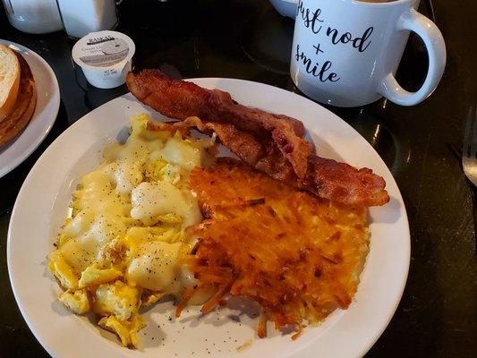 2 eggs breakfast with hash browns and bacon