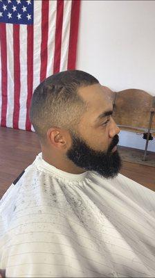 Zero fade and blended into the beard