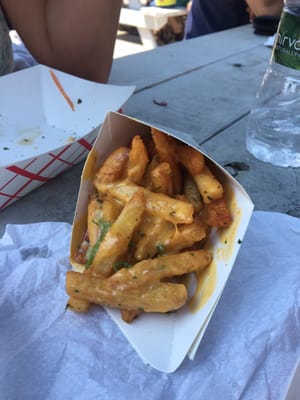 Queso papitas. These fries would be great even without the queso. Super crispy and the herb season is so tasty