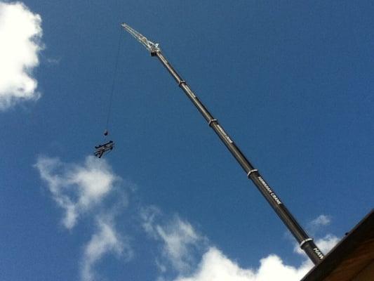 Removing the top of the old pole.