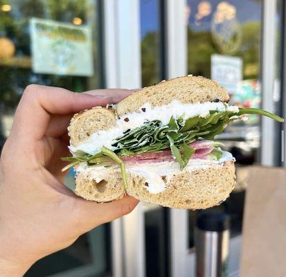 Everything bagel with cream cheese, watermelon radish, arugula