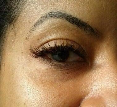 1 of my favorite sets I've done. Black set w/ brown, gold and burgundy highlights (colored lashes)