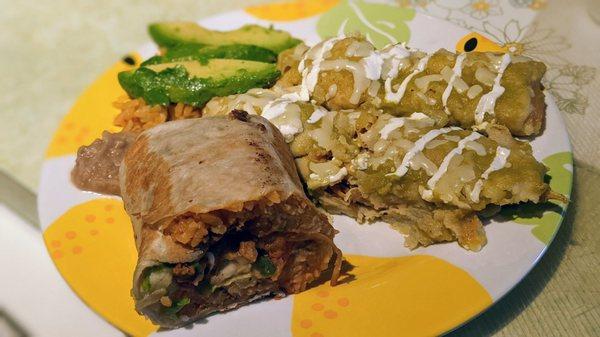 Take out shared dinner of burrito con mole and enchiladas verdes. The avocado was my own add-on.