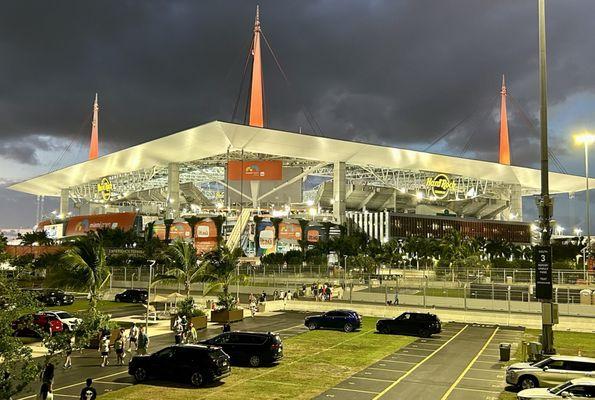 Hard Rock Stadium lit up for a night session.