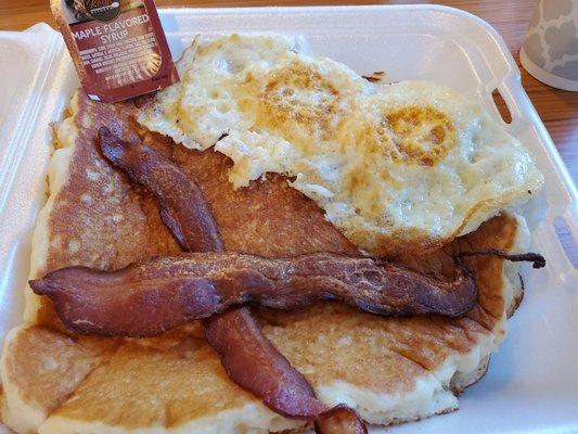 Pancake plate with 2 eggs over easy. Pancake barely fits in box. Nice, fluffy and filling!