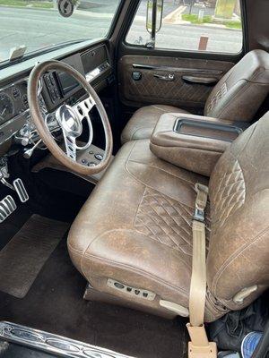 Reupholstered seats with Diamond stitching. Matching door panels and steering wheel!