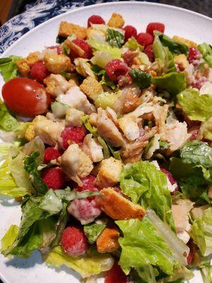 Caesar's Salad with Chicken and Raspberries.