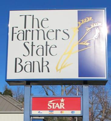 Sign for The Farmers State Bank at the corner of SR 43 and 4th St.