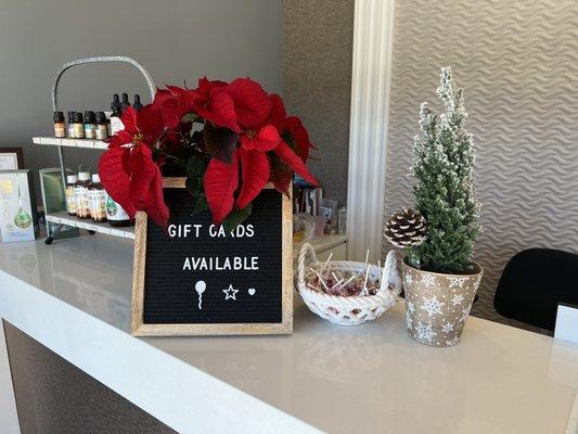 Front counter with sign showing Gift Cards available for any occasion