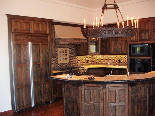 Rancho San Carlos--kitchen cabinet Mexican Tar and waxed finish.