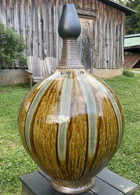 Large vase with ash glaze body, salt glaze neck and black tulip shaped rim. Life size!