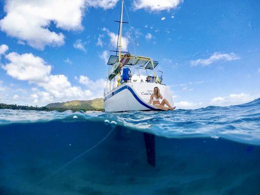 Nothing but serene smiles when you're onboard Caelestis for a sail, anchor & swim!