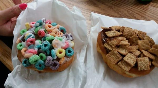 Donut with Fruit loops and the other is cinnamon toast crunch