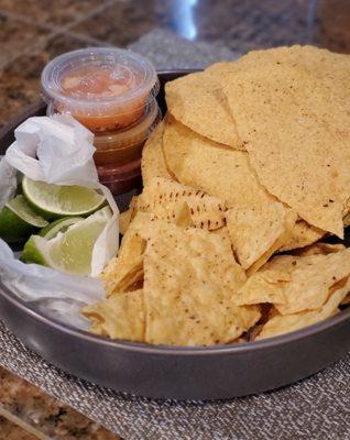 Sides from take-out with Molcajete and tacos order.