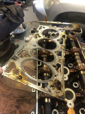 This is the head gasket from a 2011 Chevrolet HHR... you can clearly see where it was leaking.