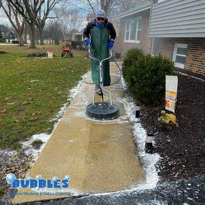 Power washing of home walkway.