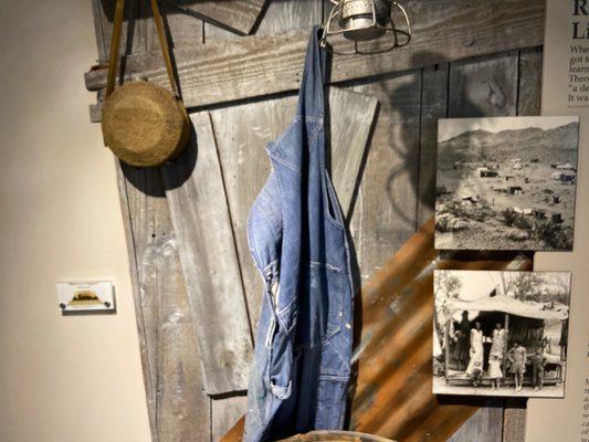 Clothing worn by some Boulder City Dam workers and a canteen to quinch their parched mouth.