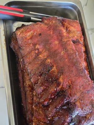 Our smoked ribs are the real deal--fall-off-the-bone tender, perfectly seasoned, and kissed by smoke. BBQ dreams? We just made them real.