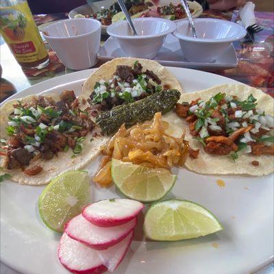 Carne, Al Pastor, and Carnitas tacos