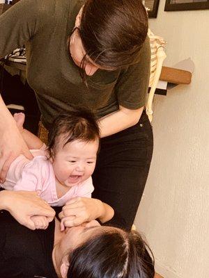 This happy baby's first spinal check-up