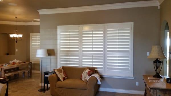 Wood Shutter with 4 1/2" Louvers and 3 - sided Z frame with sill.