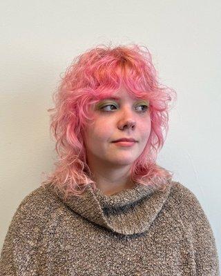 Curly shag with full curtain bangs.