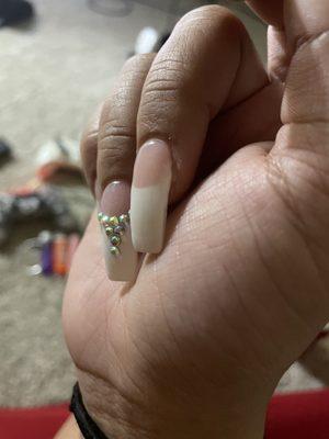 What I got. Look at the corner of my nail and how the white powder isn't curved