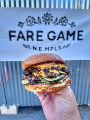 Fare Game Burger 2 Smashed Patties, American cheese, White BBQ, Griddle Onions, Mustard Pickles, Brioche bun