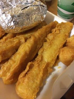 Fish, baked potato, hush puppies and crunchy bits. Did you know they will sell those to you if you ask? $1.00 approx. for a cup