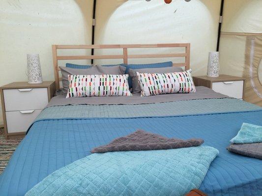 Queen bed in a tent - amazing.