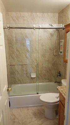 Barn door slider on a bathtub