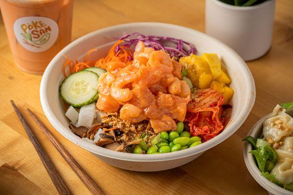 Chicago Bowl  Dive into sushi rice, fresh tuna, salmon, spicy tuna, and vibrant veggies with mango, cucumber, and spicy mayo.