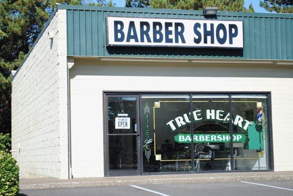 Painted barber shop glass sign