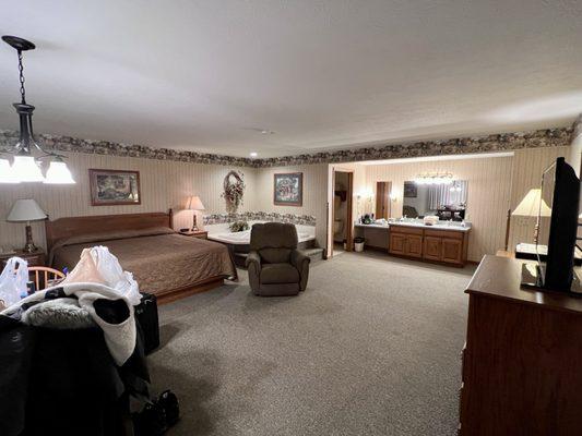 King bed jacuzzi tub room.