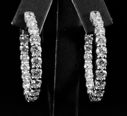 oval in and out hoop earrings,each with 36 diamonds weighing 6.5ct