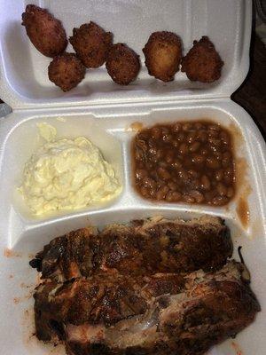 Rib Plate with beans, potato salad, and hush puppies