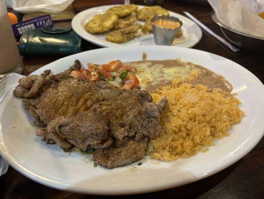 had the Carne Asada with tostones, que rico!!