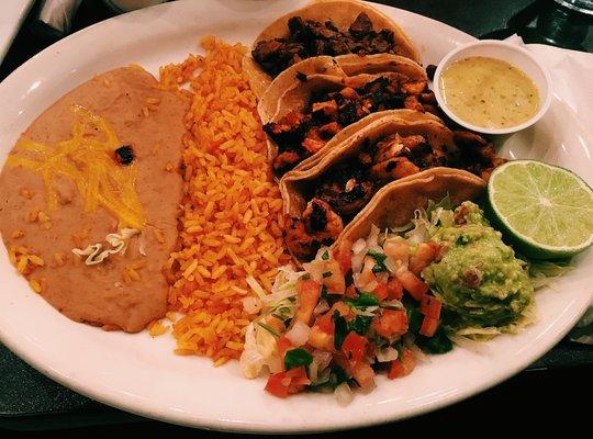 Chipotle shrimp, chipotle chicken, and steak street style tacos.