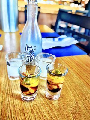 Sho Chiku Bai Nigori Sake and Uní shots (not on the menu, you have to ask for it)